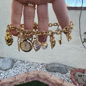 Kirk’s Folly Vintage 90s gold tone Charm Bracelet watch